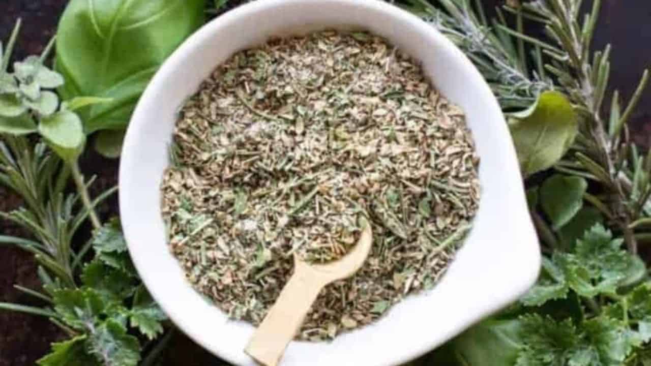 A jar of homemade zesty Italian seasoning and dressing mix.