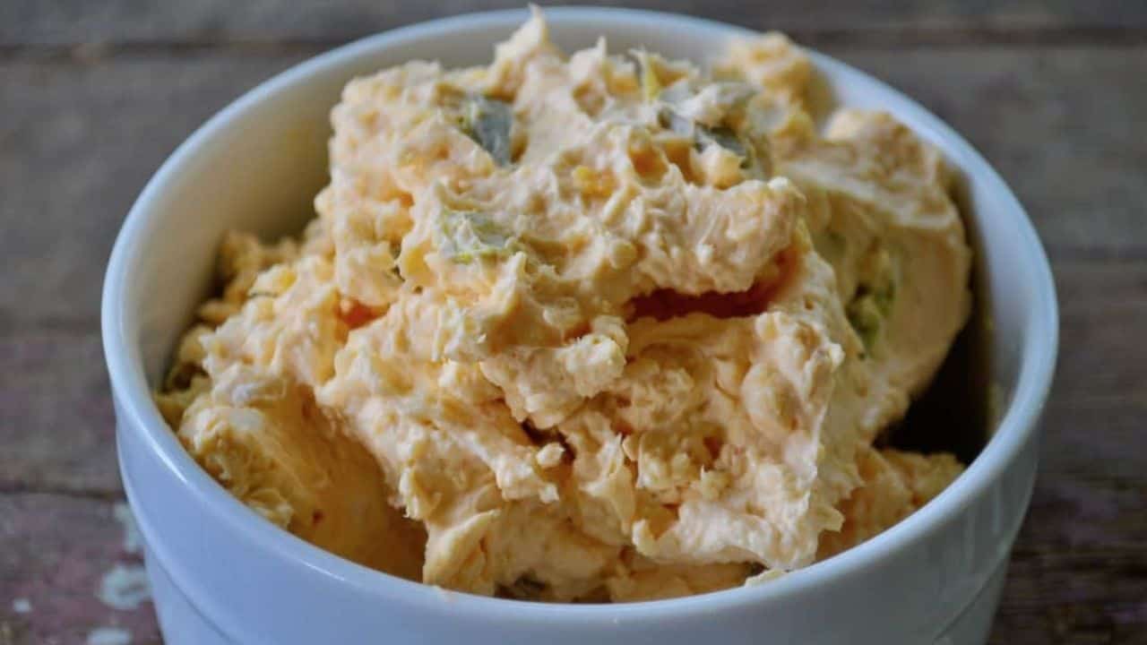 A bowl of jalapeño cheese dip.