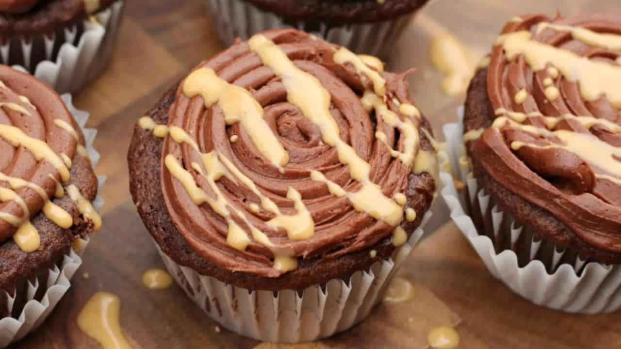 Cupcakes on a cutting board.