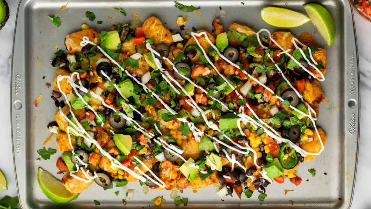 An overhead image of tater tot nachos served on a plate.