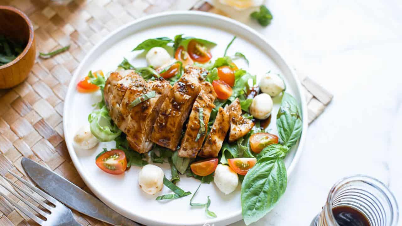 Caprese Salad on a white plate.