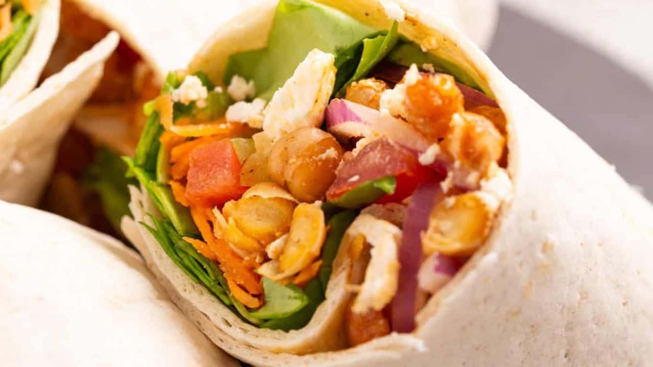 An image of buffalo chickpea wraps on a plate.