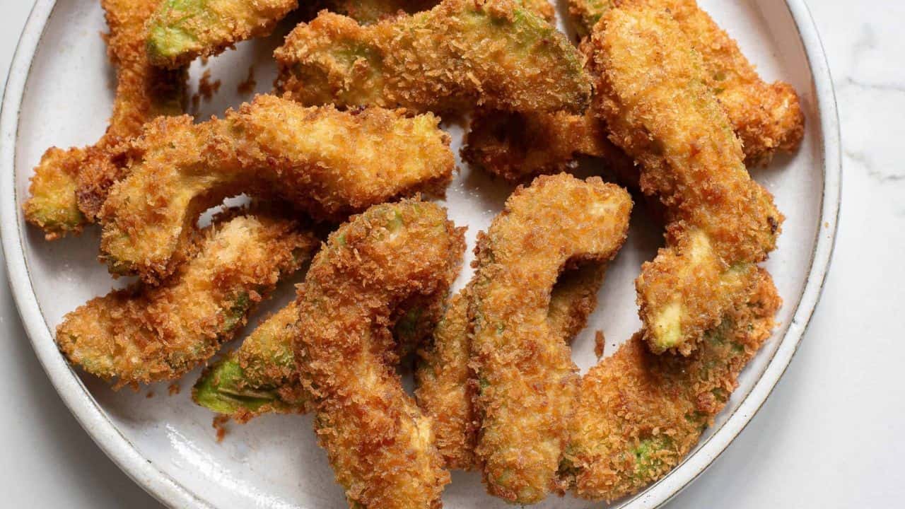 Fried avocado on a plate.