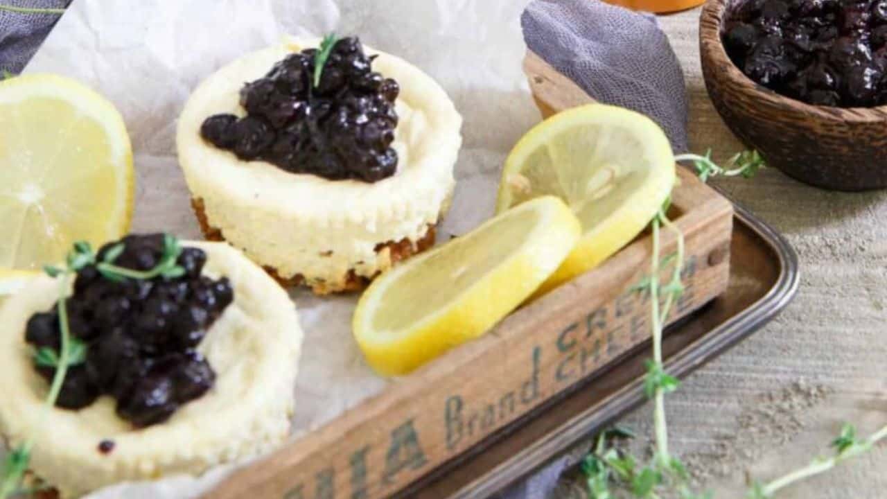 Mini lemon blueberry cheesecakes with granola crust.