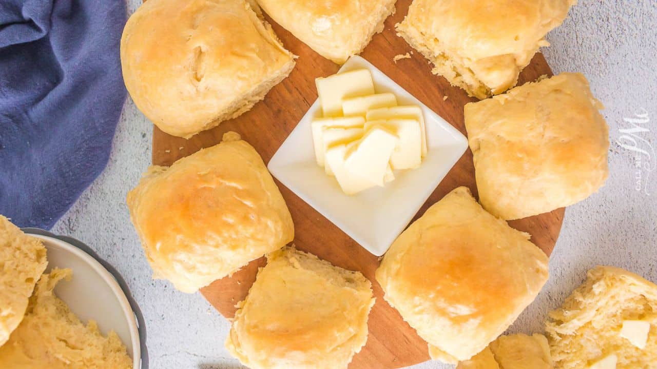 Sourdough Dinner Rolls on a cooling rack.
